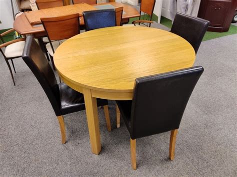 ikea extendable dining table  high  black chairs  stoke