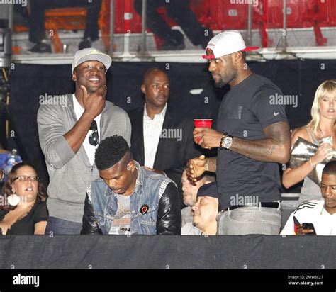 Dwyane Wade And Lebron James Chat In The Vip Section While Waiting For