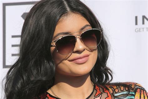watch kylie jenner get an ear piercing thanks to snapchat teen vogue