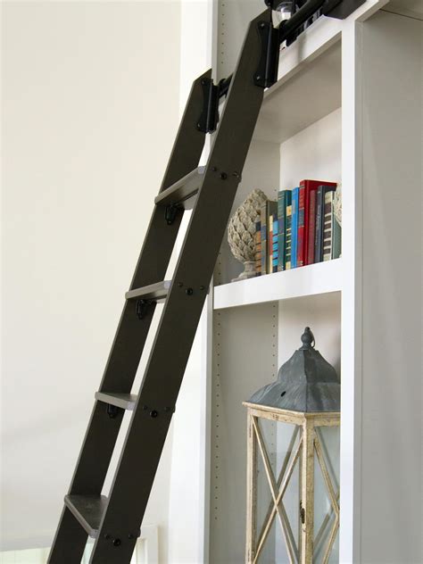 black library ladder against white shelves hgtv