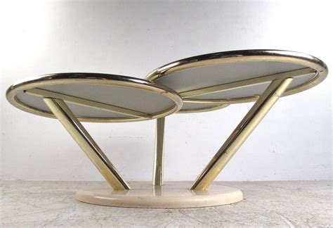 Unique Mid Century Brass And Glass Swivel Top Coffee Table