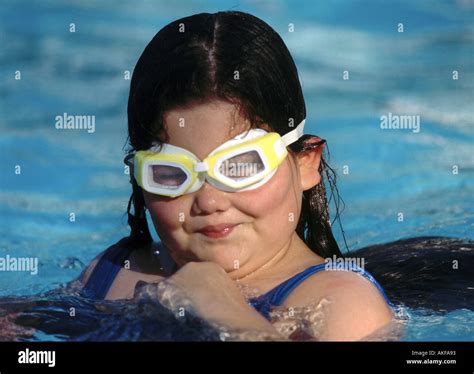 fat girl pool  res stock photography  images alamy