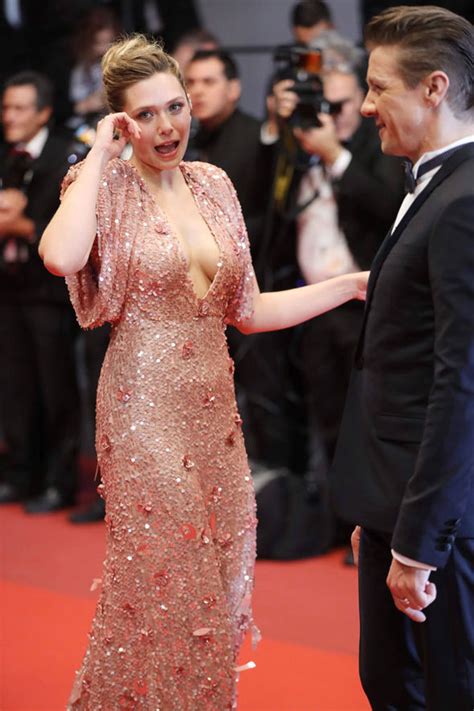 Elizabeth Olsen Risks Nip Slip In Boob Baring Gown At Cannes
