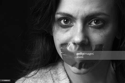 Sad Womans Face With Duct Taped Mouth And Smeared Makeup