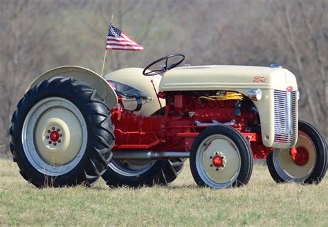 farmall tractor  american flag   front parked   field