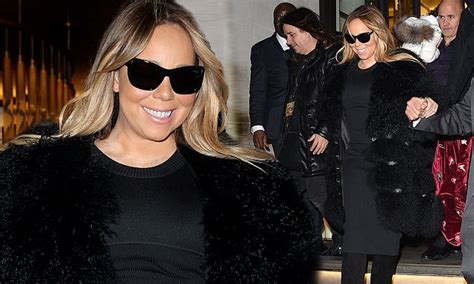 Mariah Carey Wraps Up In Faux Fur Coat After London Show