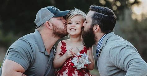 birth dad and ‘bonus dad pose with daughter in sweet photoshoot