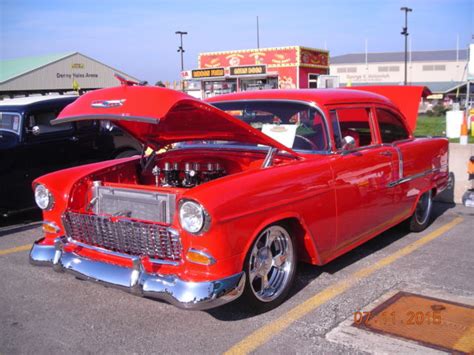 55 Chevy 210 2dr Sedan Hot Red W Red Leather Interior Pro