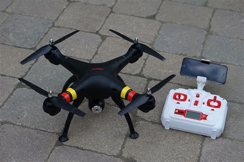 syma xw  excellent choice   beginner fpv  chrome drones