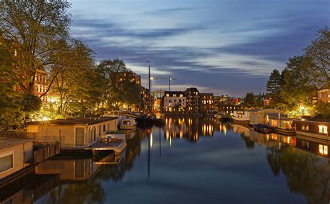 image amsterdam netherlands pier river evening cities building