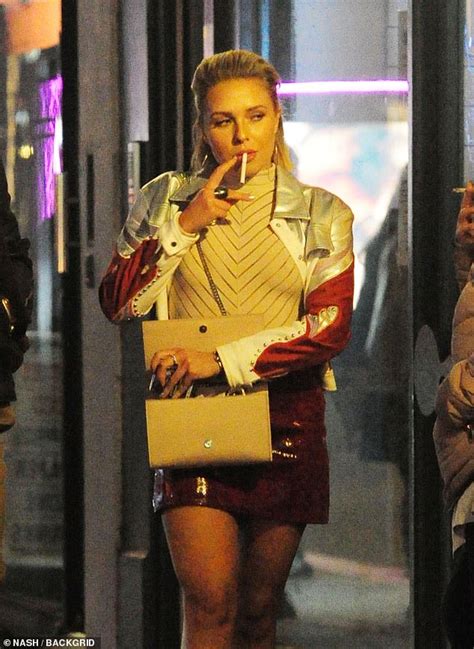 gabby allen goes braless in skintight top as she puffs on a cigarette