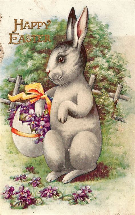 vintage easter bunny holding flowers clipart   cliparts
