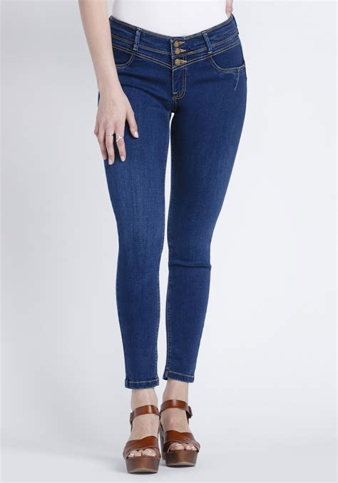 women s indigo stacked button skinny jeans warehouse one