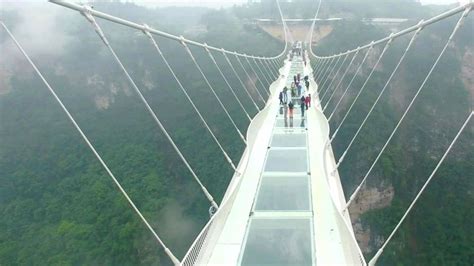 china s giant glass bridge hit with sledgehammer bbc news