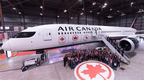 air canada proudly flies  flag  renewed canadian olympic