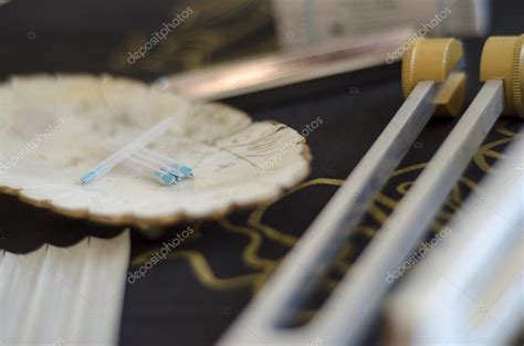 acupunture needles  healing tuning fork stock photo  thefull
