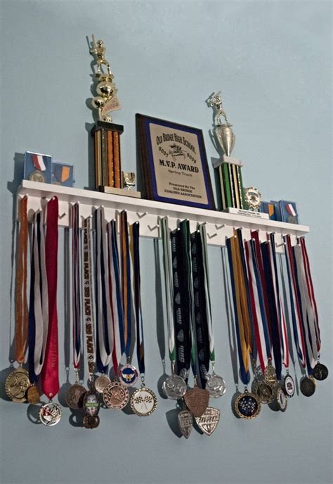 pin  linn stanley  award displays medal display trophy display trophy shelf
