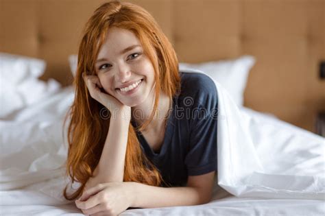 Smiling Redhead Beauty In Front Of Fireplace Stock Image Image Of