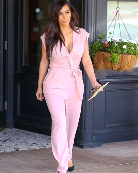 kim kardashian works pink jumpsuit from her own lipsy collection here