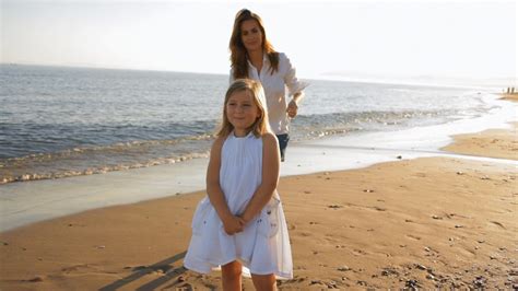 Mother Cuddling Daughter On Beach Stock Footage Sbv 300614506 Storyblocks