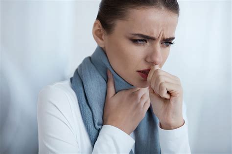 physiotherapist helps  coughing