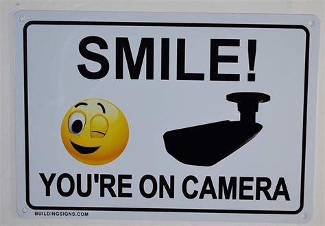 pack smile youre  camera sign