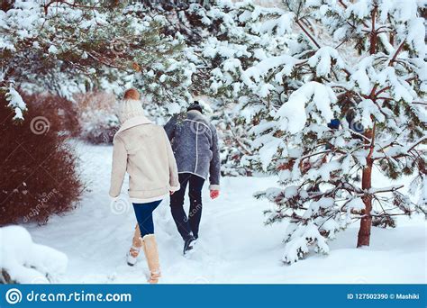 Lifestyle Winter Portrait Of Romantic Couple Walking And