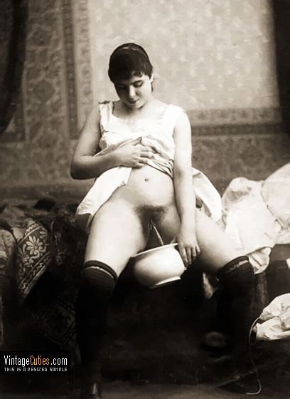 maid with a furry hole peeing into the large mug antique