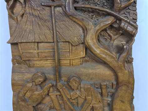 large wooden deep relief carving