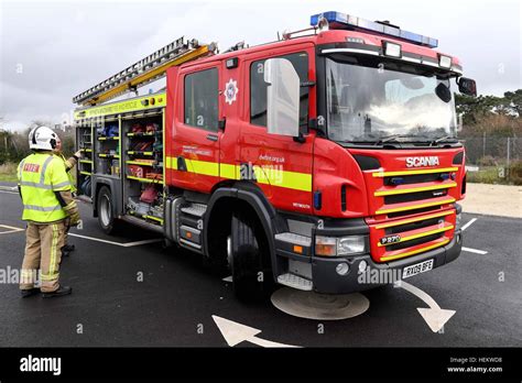 fire engine firefighter  fire engine uk stock photo alamy