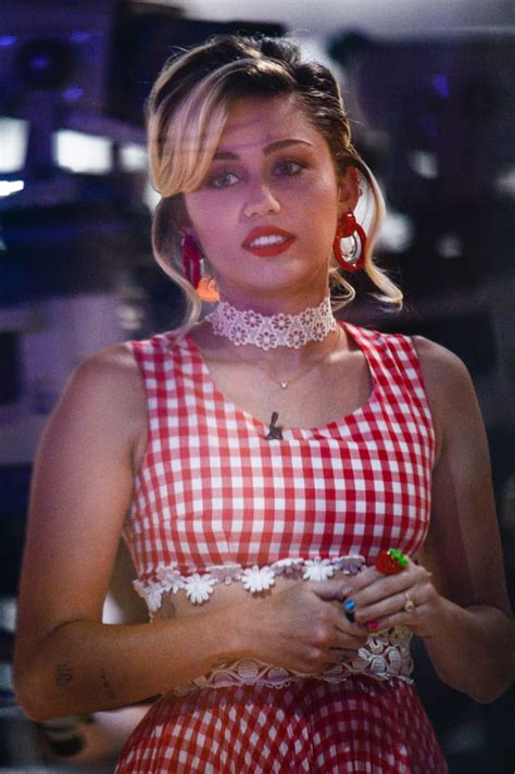 and it certainly paired well with her checkered outfit miley cyrus s