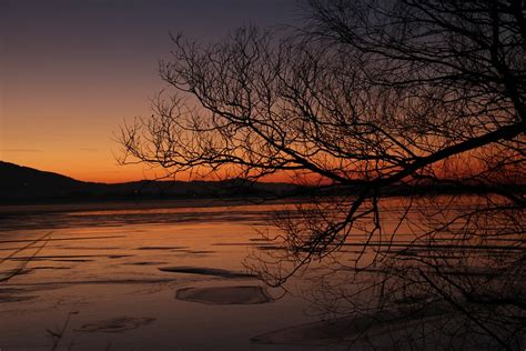 photo lake winter evening sunset ice  image  pixabay