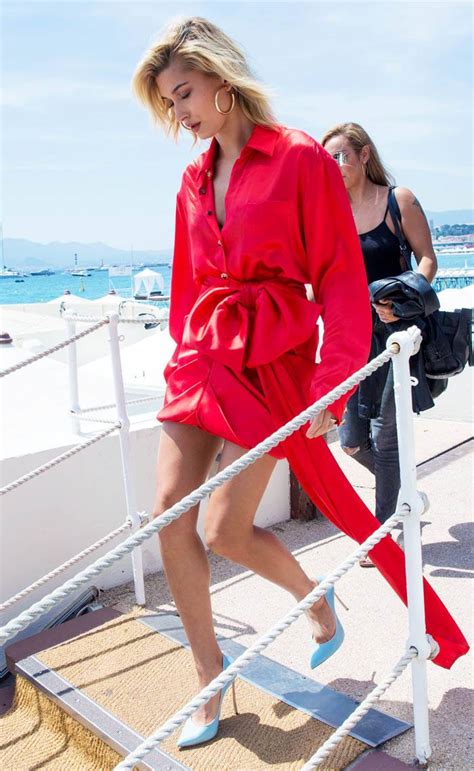 hailey baldwin wears red shirt dress at cannes film festival who what