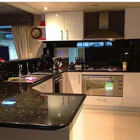 pin  vickki scott  house ideas   black granite countertops black kitchens kitchen