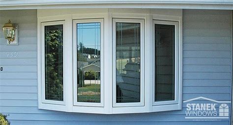 white  lite bow window  overhang tie  casement windows pella bay window exterior