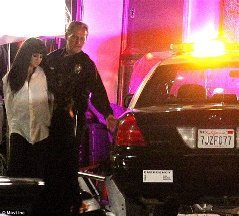 selena gomez is handcuffed by police on set of new music video daily