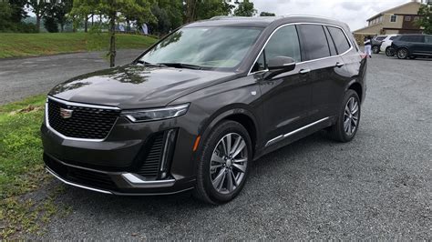 cadillac xt review  row suv tackles luxury leaders