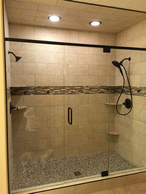 master bathroom double shower heads frameless glass shower door oil rubbed bronze ceiling