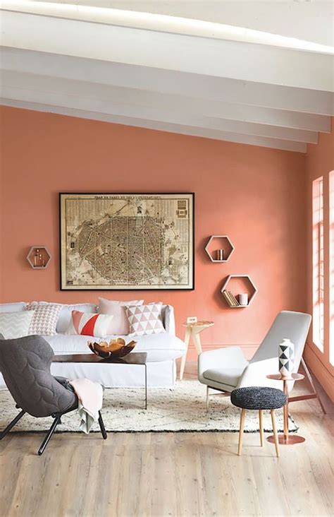 stylish contemporary living room   coral statement wall light