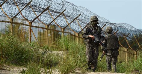 n korea s korea in border fire kim jong un orders semi war state