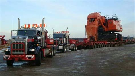 semitrckn — rollerman1 a hitachi ex5500 excavator being trucks