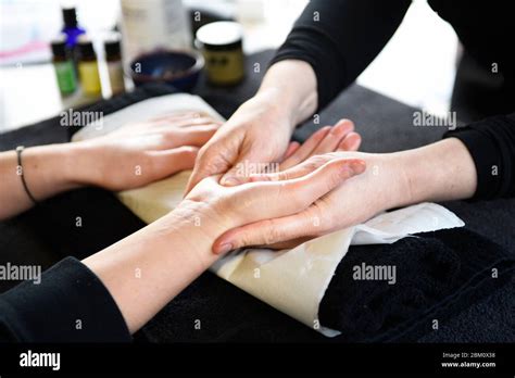 a hand massage session sometimes known as hand reflexology hand