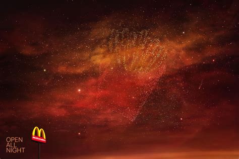 fireworks  lit    sky   mcdonalds sign