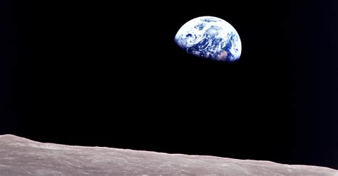 view  earth  space unifies world   year  turmoil