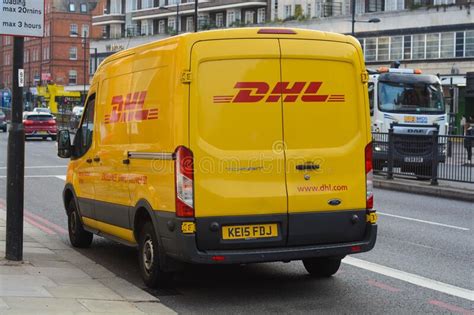 dhl logo  yellow delivery car parked   street editorial photo image  january