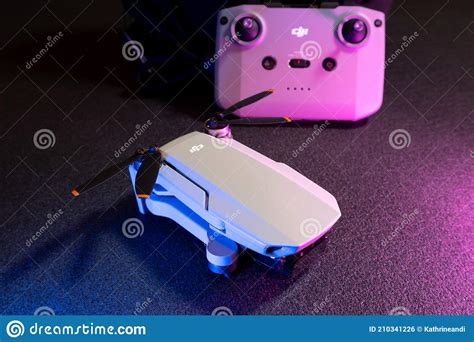 dji mini   drone close   remote control editorial photo image  blue device