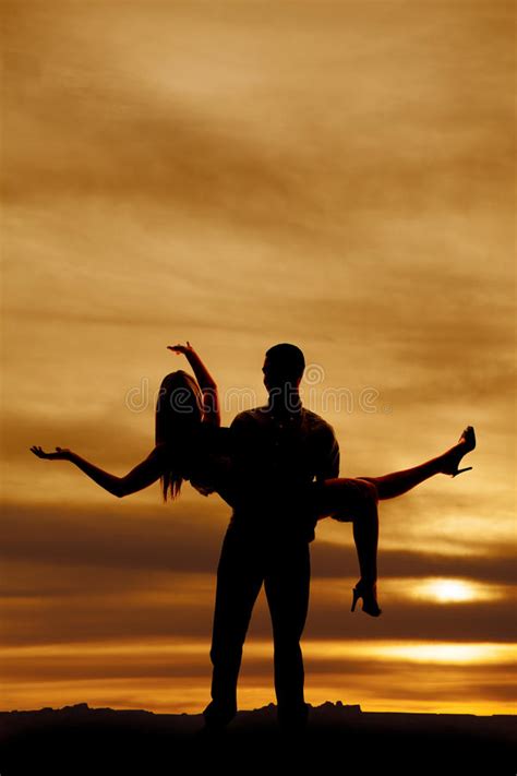 silhouette of man holding woman with arms out stock image image of nature happy 31608461