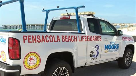 pete moore chevrolet donates  trucks  pensacola beach lifeguards