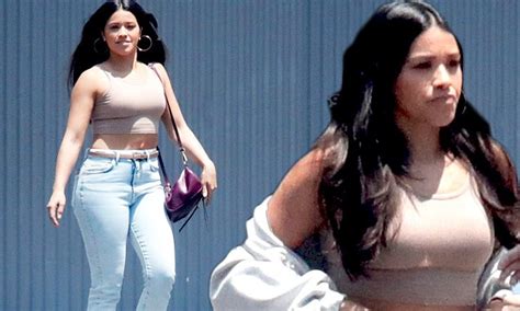 gina rodriguez flashes her tummy in nude crop top in la