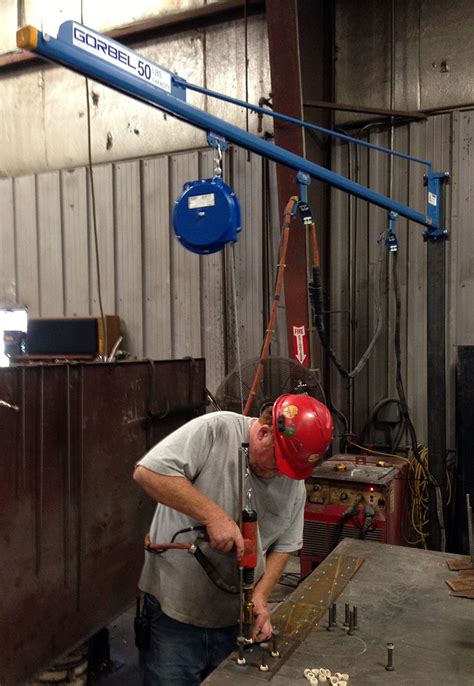 ergonomic partners ergonomic solutions blog tool balancer jib crane  welding workstation